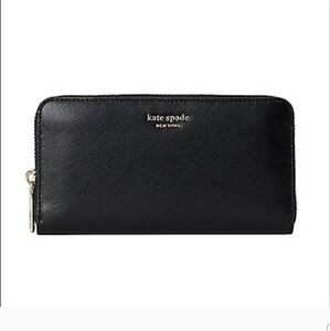 This is a Kate Spade Leila Large Pebbled Leather Continental Black Wallet.